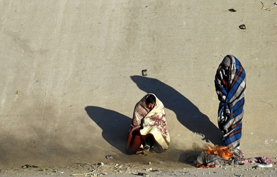 Migrantes que habitan temporalmente en las calles de la fronteriza Ciudad Juárez, al norte de México, permanecen desprotegidos ante la ola gélida, afectando principalmente a quienes duermen en la intemperie. Migrantes que habitan temporalmente en las calles de la fronteriza Ciudad Juárez, al norte de México, permanecen desprotegidos ante la ola gélida, afectando principalmente a quienes duermen en la intemperie.